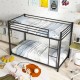 Twin over twin metal bunk bed in black with full-length guardrails and ladder, ideal for space-saving in kids' rooms.