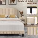 Beige upholstered bed frame with rivet headboard, solid wood structure, and wood slats for enhanced stability and style.