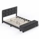 Upholstered bed frame with a wide headboard and solid wood slats, providing stability and stylish ottoman storage.