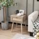 Modern rattan nightstand with drawer and solid wood legs, featuring a natural finish for bedroom or living room decor.