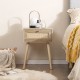 Modern rattan nightstand with a drawer and solid wood legs, featuring a natural finish for bedroom or living room decor.