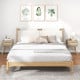 Natural rattan nightstand with drawer and solid wood legs, perfect for bedroom or living room decor.