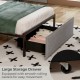 Large storage drawer with smooth rolling casters under a twin size bed frame, upholstered in breathable linen fabric.