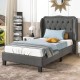 Twin size bed frame in gray with button tufted wingback headboard and under-bed storage, perfect for cozy bedrooms.