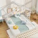Extendable house bed in white with roof and fence rails, designed for twin to king size use, perfect for kids' rooms.