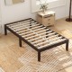 Twin wood platform bed frame in espresso with sturdy slats and ample under-bed storage for minimalist home decor.
