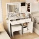 White makeup vanity desk with mirror and adjustable LED lights, featuring ample storage and a matching stool set.
