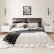 Floating nightstand with drawers in white, wall-mounted design for space-saving storage in modern bedroom decor.