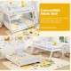Twin over full low bunk bed in white with reversible ladder, convertible to two beds for kids' rooms or guest spaces.
