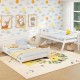 Twin over full low bunk bed in white with reversible ladder, perfect for kids' rooms and space-saving solutions.