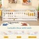 Twin size floor bed with high fence and lockable door, crafted from sturdy pine wood for kids' safety and play.