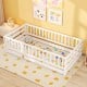 Twin size floor bed with high fence and door, crafted from sturdy pine wood, ideal for kids' sleeping and play area.