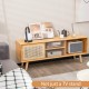 Modern TV stand in natural bamboo with rattan sliding doors, adjustable shelf, and cable management for organized.