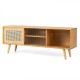 Modern TV stand in natural bamboo with rattan sliding doors and adjustable shelf for stylish storage and organization.