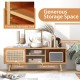 Modern TV stand with rattan sliding doors, adjustable shelf, and spacious tabletop for stylish storage and organization.
