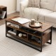 3-tier industrial style coffee table in rustic brown with open shelf and storage cubbies, perfect for living room use.