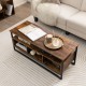 Rustic brown 3-tier coffee table with open shelf and 3 storage cubbies, ideal for living room organization and style.