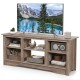 Gray TV stand for up to 65-inch TVs featuring adjustable shelves and ample storage for decor and electronics.