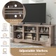 Gray TV stand with adjustable shelves, designed for 65-inch TVs, offering storage for speakers and ornaments.