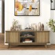 Oak TV stand with dual sliding doors, adjustable shelves, and rustic design, ideal for 55-inch TVs and decor.