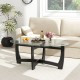 Oval coffee table with a smooth tempered glass surface and rubber wood legs, perfect for a cozy living room setting.