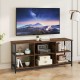 Rustic brown and black TV stand with spacious tabletop, metal mesh sides, and 6-cube storage for 65-inch TVs.