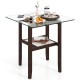 Square 24-inch brown coffee table with tempered glass top and open storage shelf, perfect for versatile home use.
