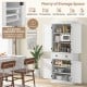 Adjustable shelves inside a white kitchen pantry cabinet, designed for versatile storage of kitchen supplies and.