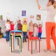 Colorful set of 6 portable plastic stack stools with sturdy steel frames, ideal for classrooms and versatile use.