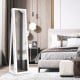 Freestanding white jewelry armoire with full-length mirror, lockable design, and ample storage for jewelry and.