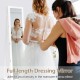 Full-length mirror with lockable jewelry armoire in white, featuring anti-rust hooks and velvet interior for jewelry.