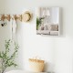 Double door bathroom wall cabinet with mirror, adjustable shelf, and modern design, ideal for small spaces.