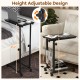 Height adjustable rolling side table with black finish, ideal for snacks and storage, perfect for sofa or bed use.