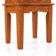 Close-up of the solid wooden legs of a vintage jewelry storage cabinet with a top flip mirror for practical elegance.