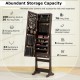 Lockable brown jewelry cabinet with LED lights, full-length mirror, and ample storage for rings, necklaces, and.