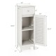 Slim white wooden bathroom storage cabinet with shutter door, adjustable shelves, and a drawer for organized storage.