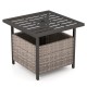 Gray outdoor patio rattan wicker side deck table with steel frame, umbrella hole, and storage for versatile use.