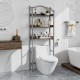 3-tier over-the-toilet storage rack in silver with engineered wood shelves for bathroom essentials and decor.