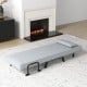 Light gray folding sleeper bed with adjustable backrest, pillow, and armrests, perfect for versatile lounging or.