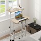 Height-adjustable mobile standing desk with split top, ergonomic design, and casters for easy mobility in a modern.