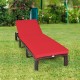 Red cushioned outdoor rattan chaise lounge with adjustable backrest, perfect for patio or poolside relaxation.