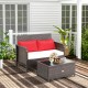 Wicker loveseat set with red cushions and coffee table, featuring hand-woven PE rattan for outdoor use.