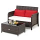 Wicker loveseat set with red cushions and coffee table, featuring black tempered glass for outdoor relaxation.