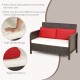 Wicker loveseat set with red zippered cushions and ergonomic backrest, perfect for outdoor relaxation by the poolside.