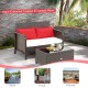 Wicker loveseat set with red cushions and coffee table, featuring ergonomic design for patio, porch, or balcony use.