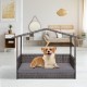 Wicker dog house with weatherproof roof and soft cushion, perfect for indoor and outdoor use in various settings.