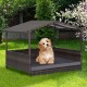 Wicker dog house with weatherproof roof and soft cushion, perfect for outdoor use in yard or garden.
