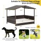 Outdoor wicker dog house with weatherproof roof, featuring a comfortable cushion and elevated design for all dog sizes.
