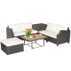 Hand-woven wicker outdoor furniture set with white cushions and acacia wood coffee table, perfect for patio relaxation.