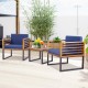 Two cushioned armchairs and a coffee table in navy, made of acacia wood, perfect for outdoor patio conversations.